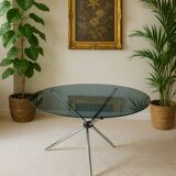 Round chrome metal table with smoked glass top from the 70s