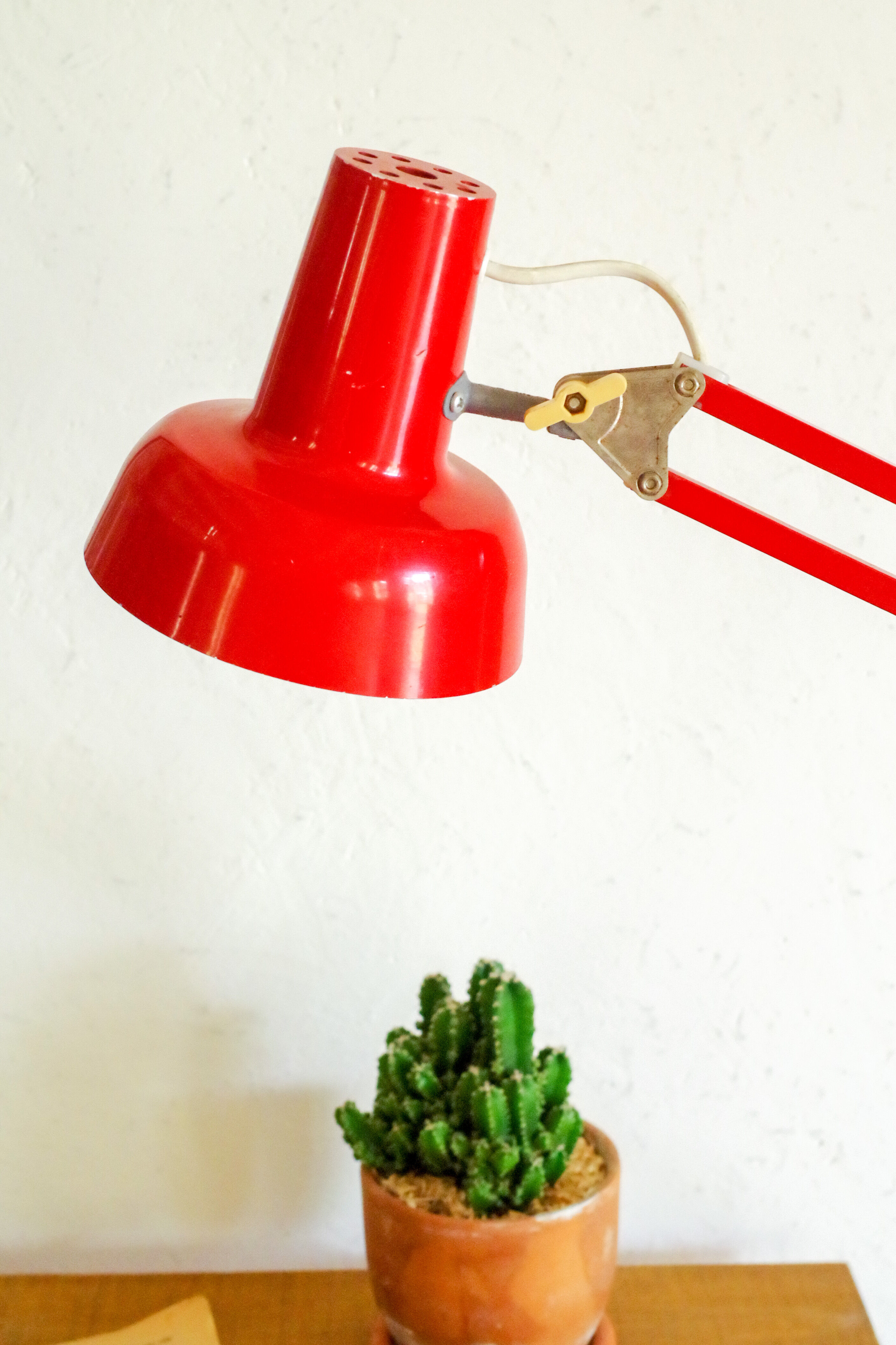 Red articulated architect lamp