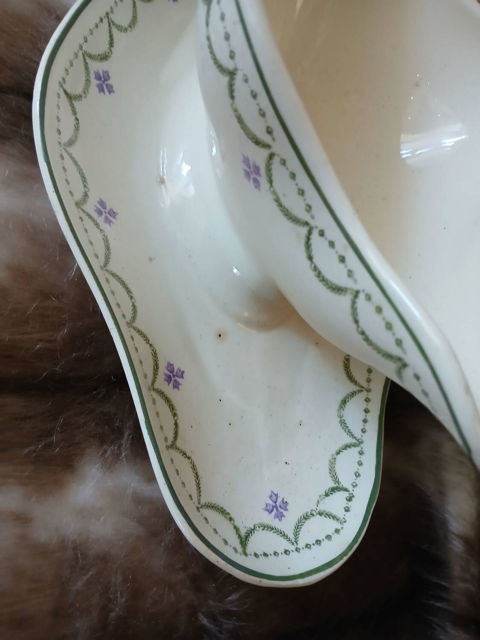 Antique sauce boat in Longwy ironstone.