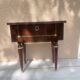 Nightstand with lovely mid-century style gold metal decor.