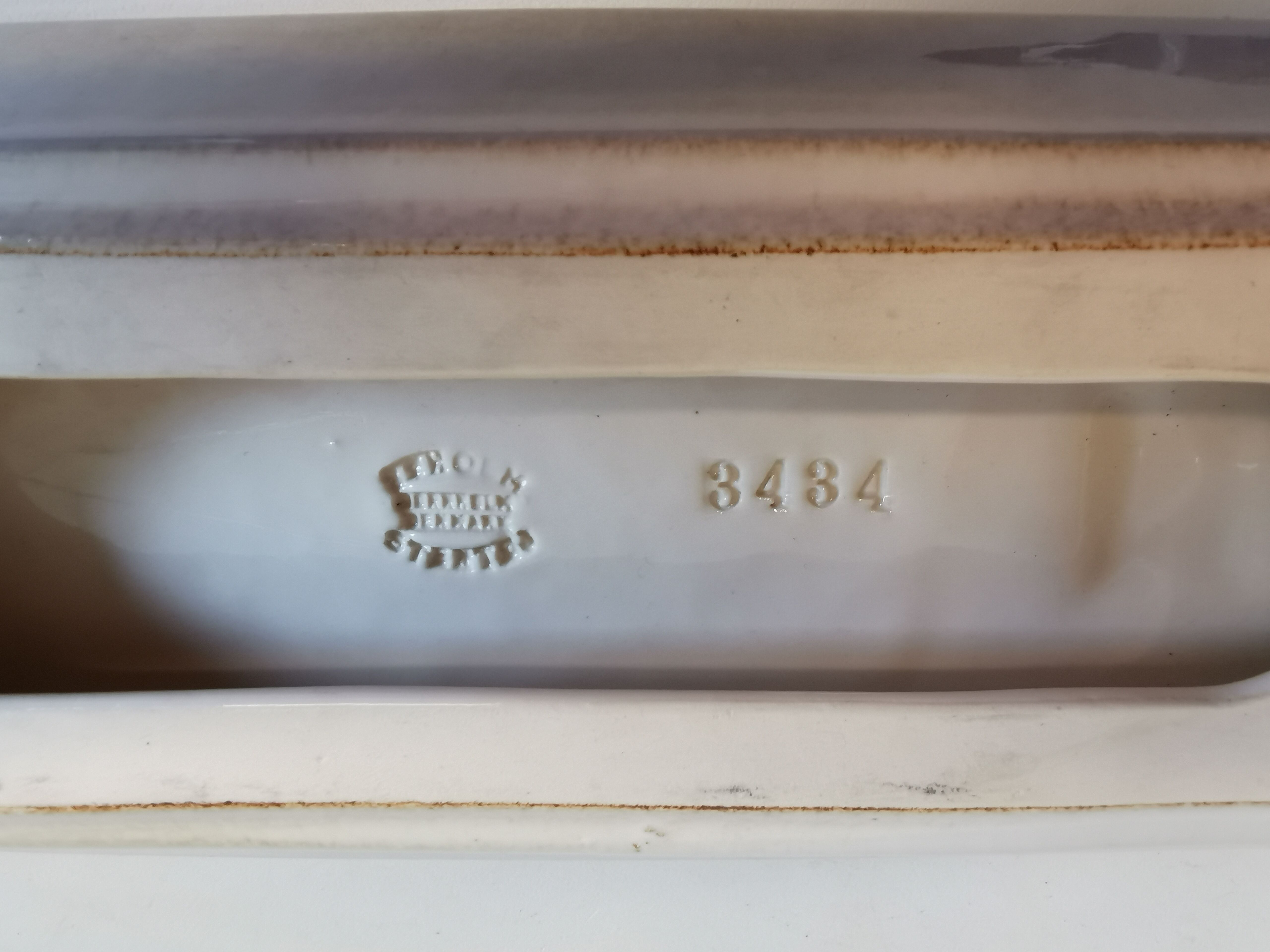 Wall-hung candle holder in ceramic, from Danske Søholm, estimated 1960s.