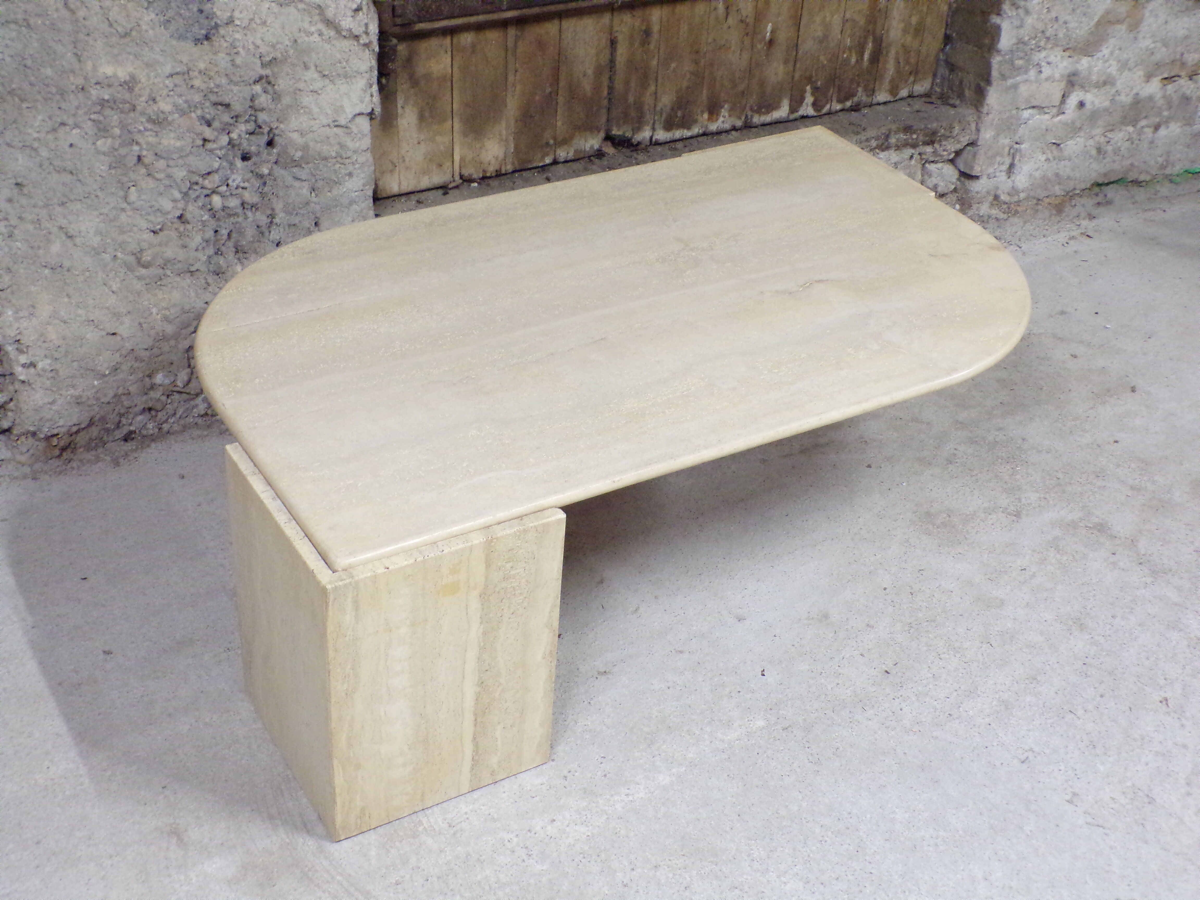 Table basse oeil en travertin 77X127 cm