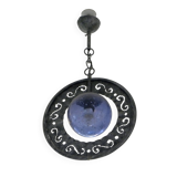 Patinated metal chandelier with cobalt blue blown glass in a rustic style.