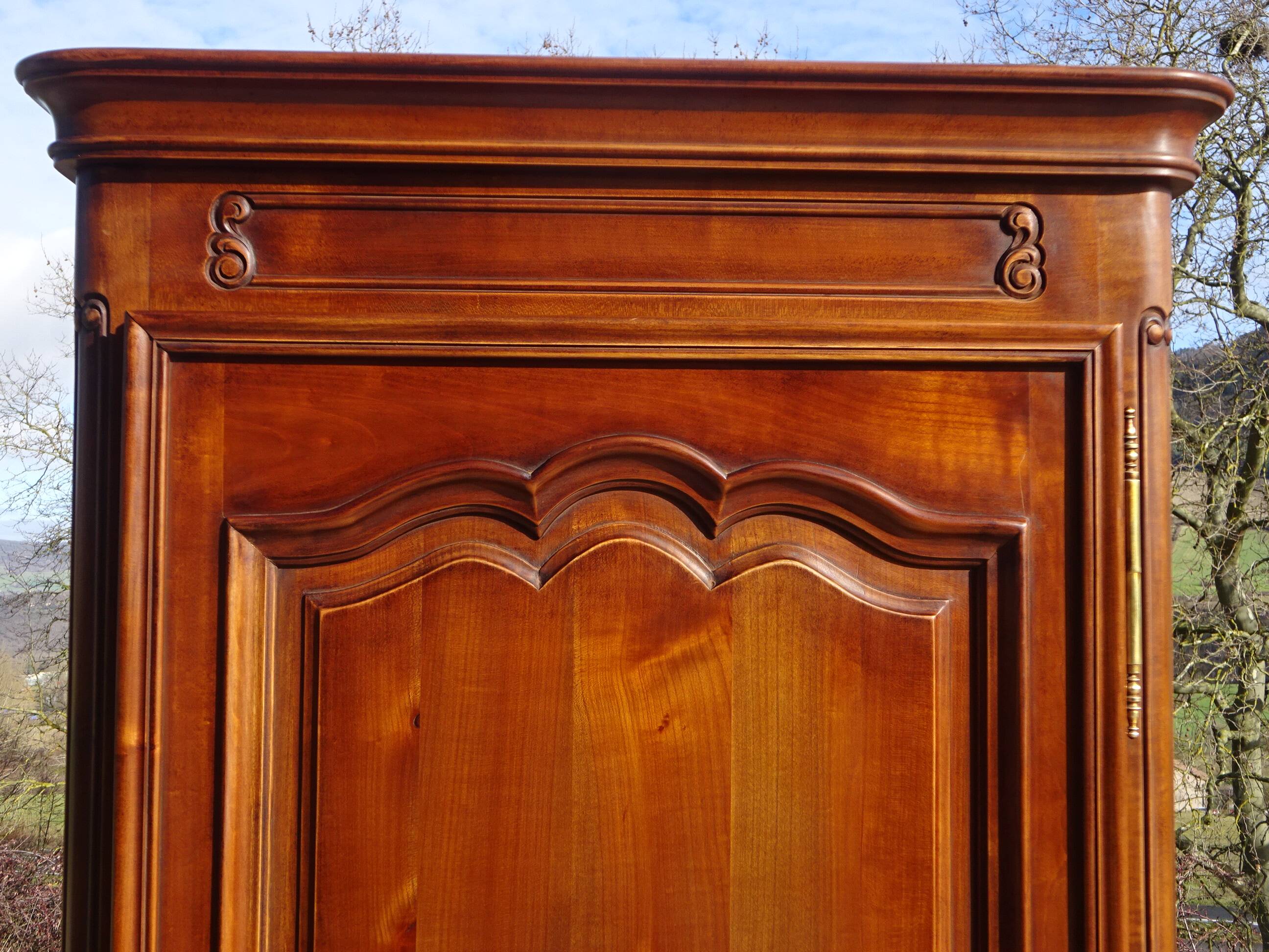 Louis XV style bonnetière in solid cherry wood