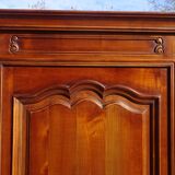 Louis XV style bonnetière in solid cherry wood