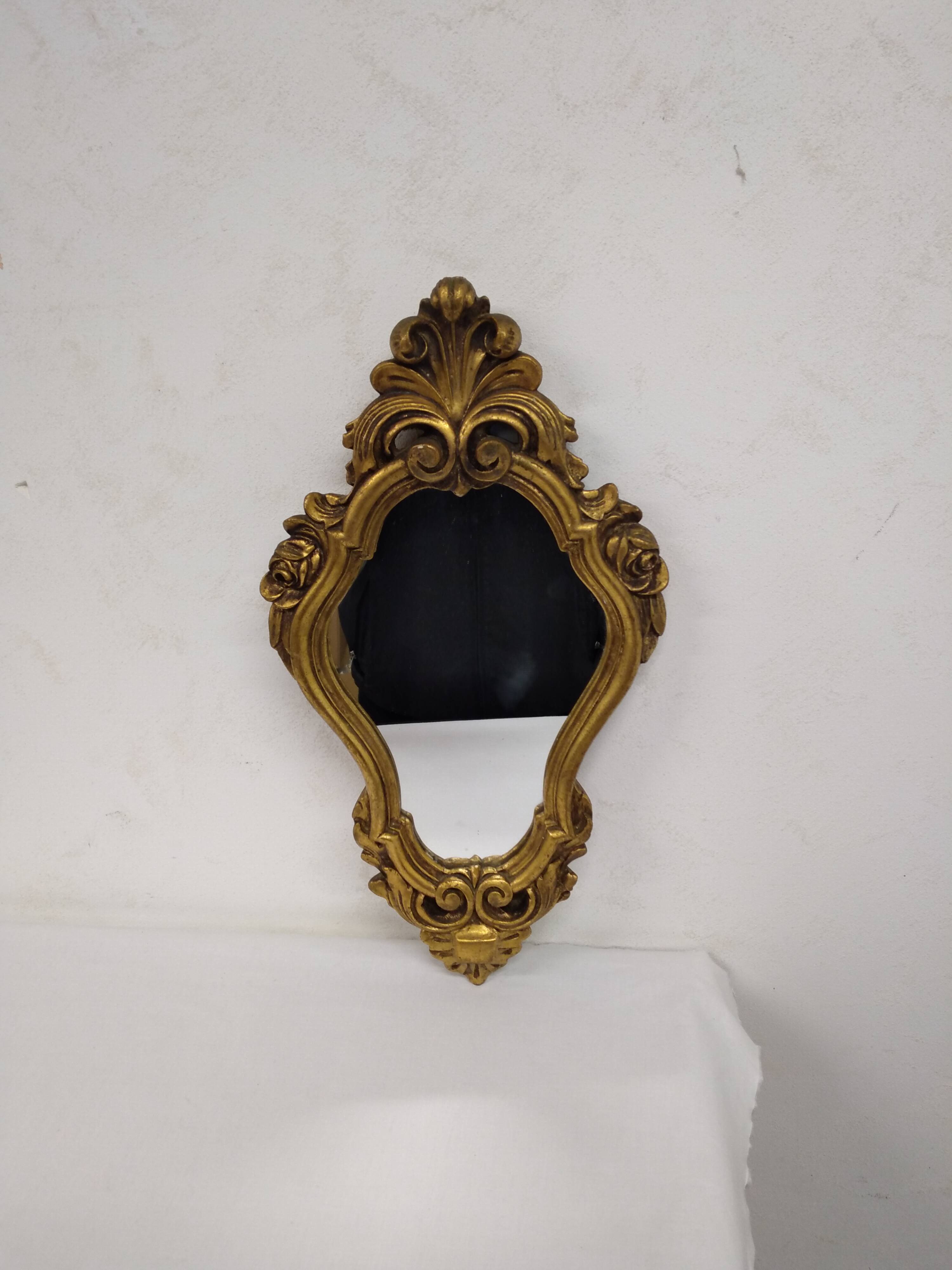 Gold stucco rocaille style mirror