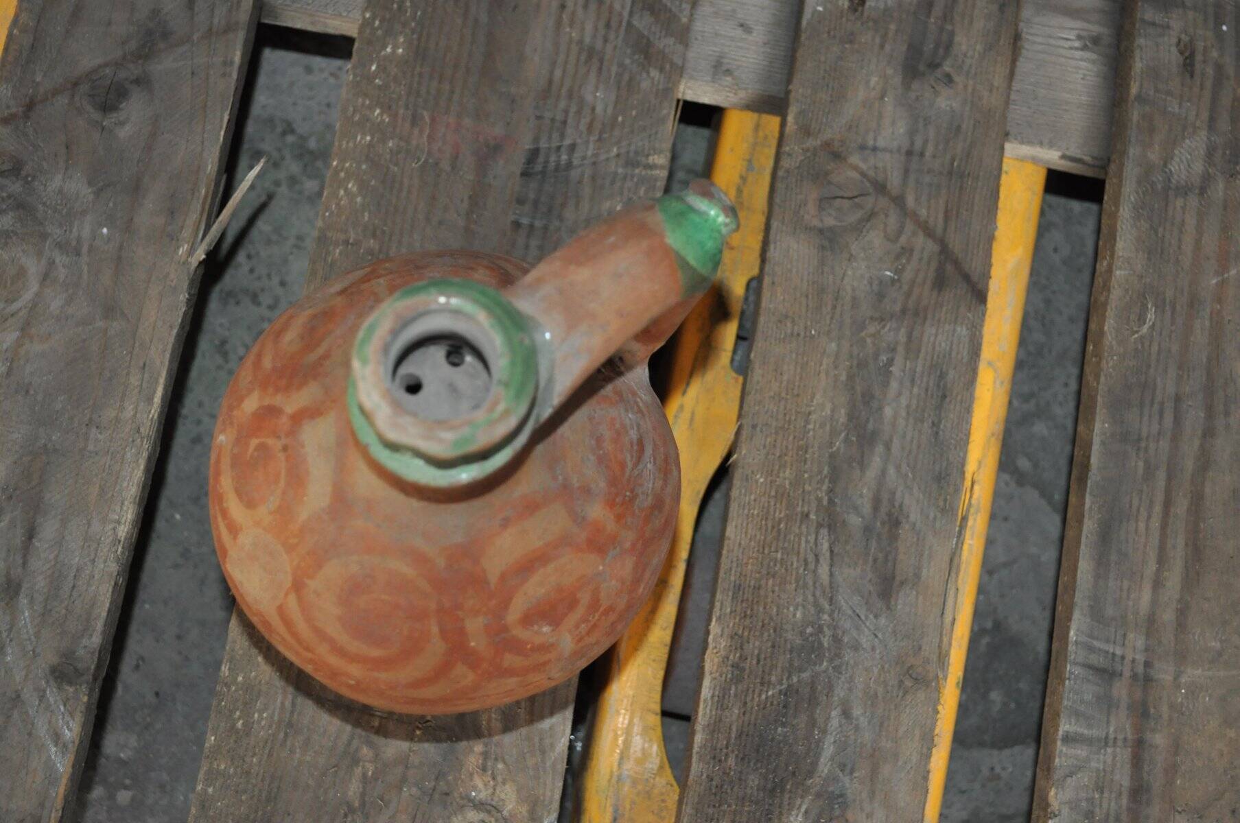 Antique red and green terracotta carafe, rustic Hungarian jug from the 1920s.