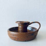 Signed sandstone candle holder