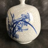 Vase boule à col pincé aplati