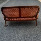 Louis XVI style sofa in natural wood