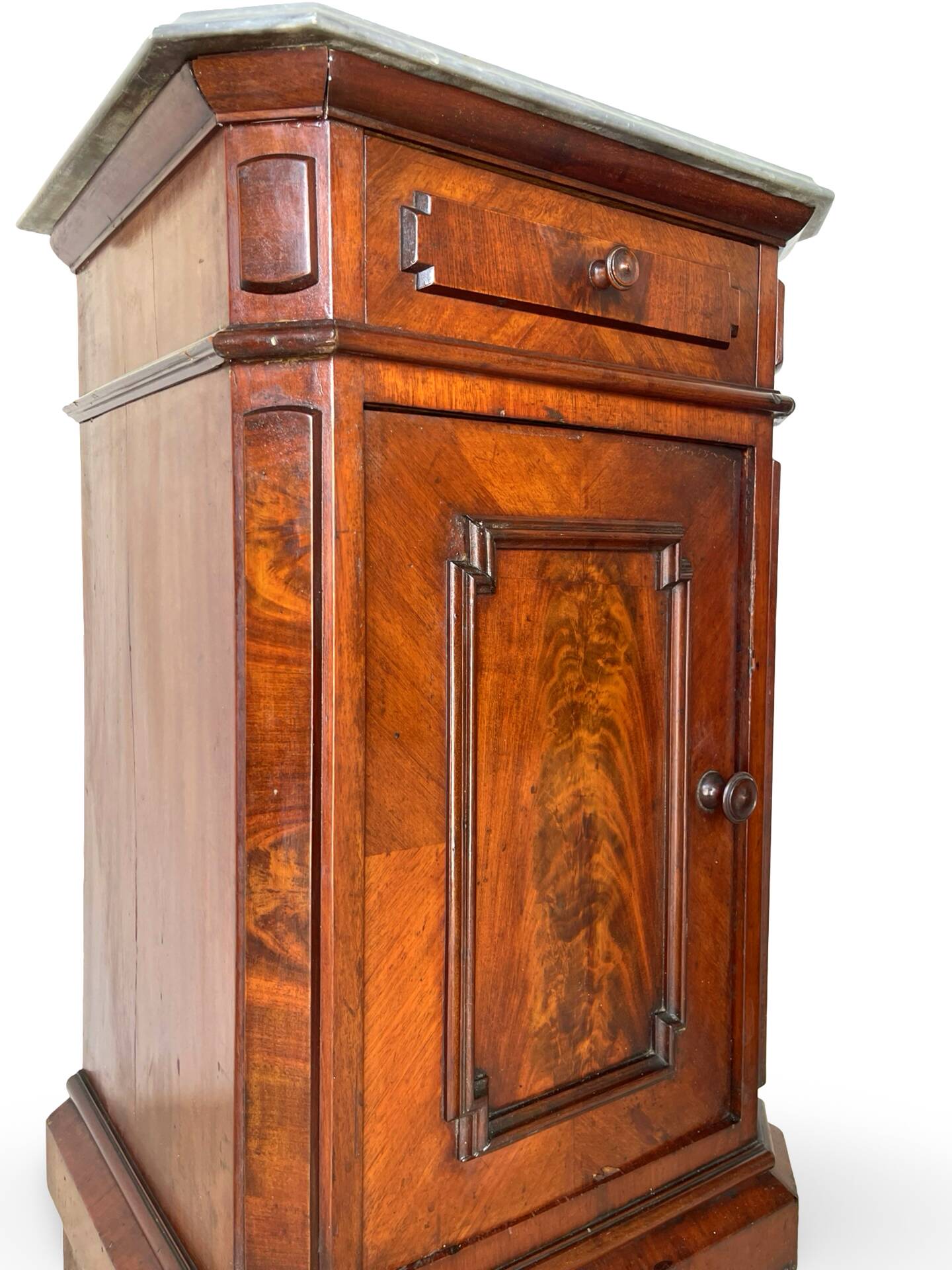 A pair of antique walnut bedside tables from the 1890s.