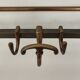 Brass wall coat rack