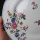7 dessert plates Bernardaud Limoges porcelain with floral decoration from the 1920s to 1950s.