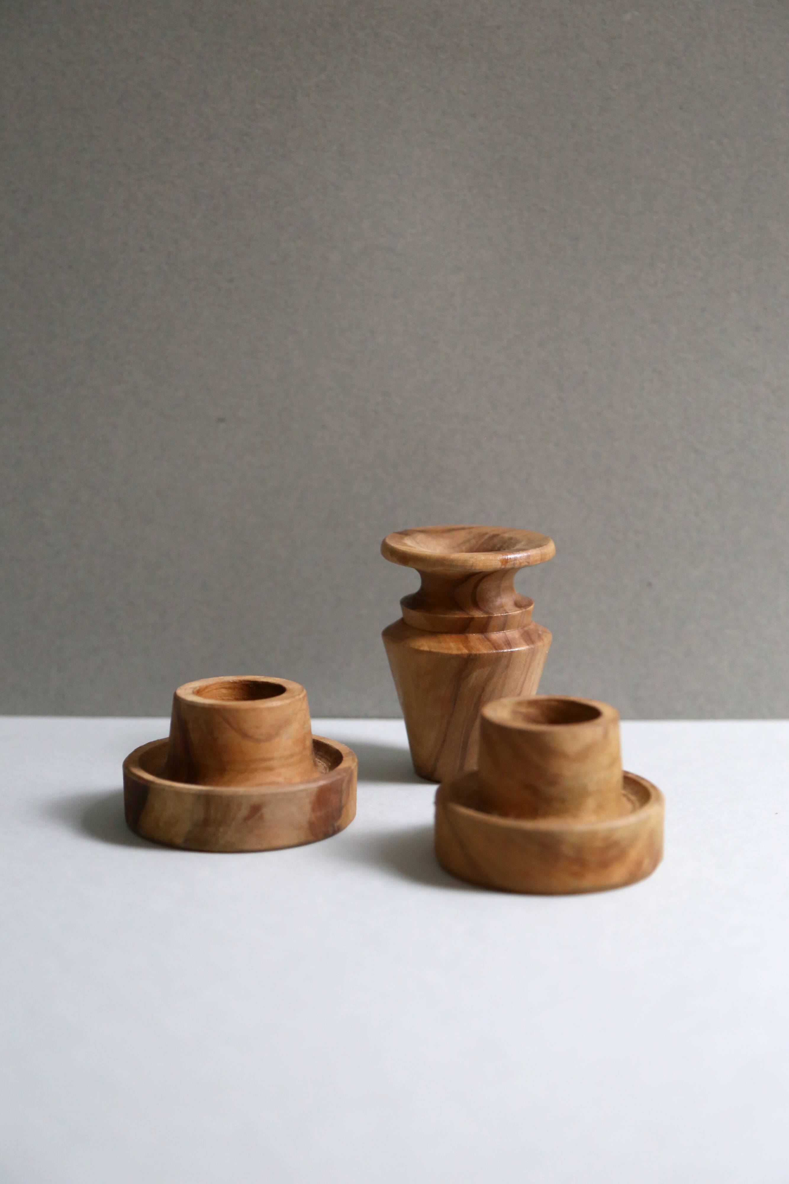Turned raw wooden candlesticks