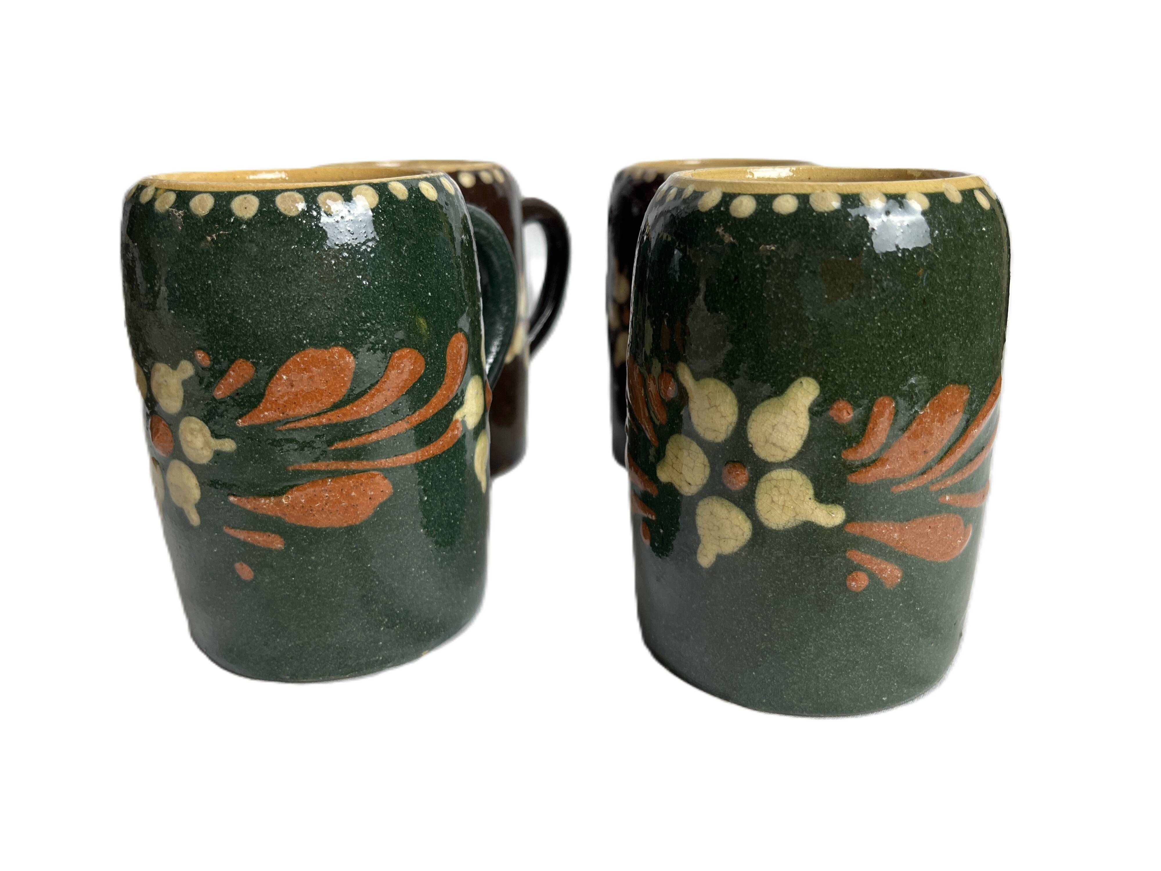 Alsatian pottery, glazed stoneware mug from Soufflenheim, 20th century.