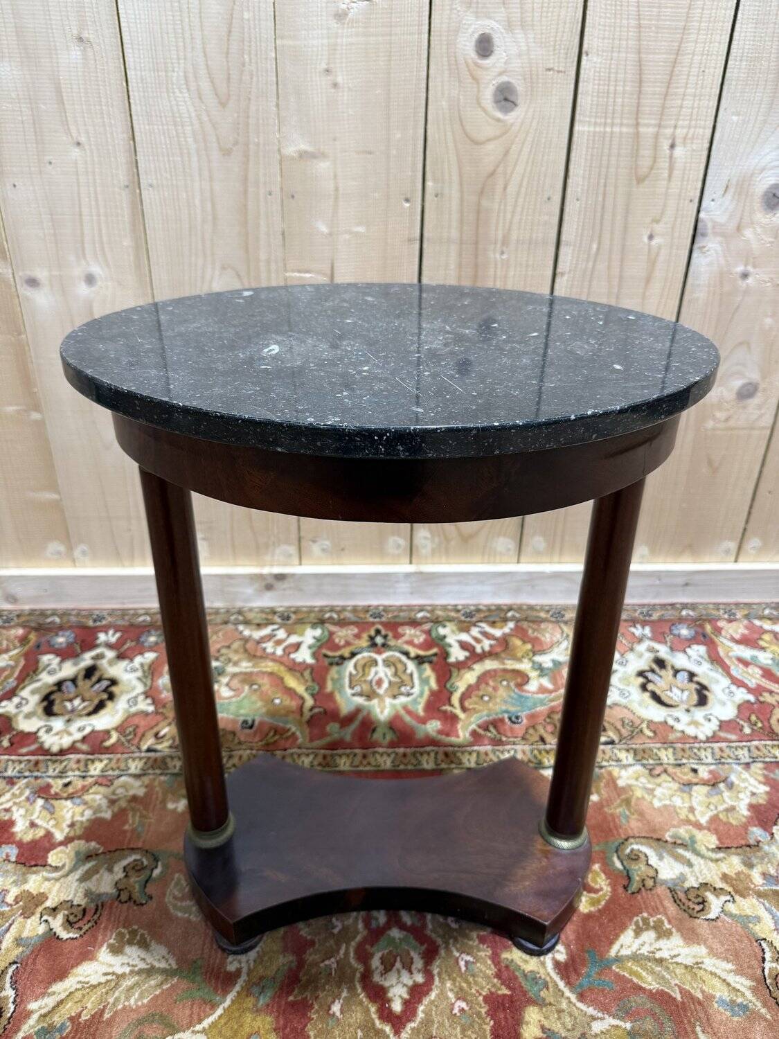 Small oval side table in Empire style