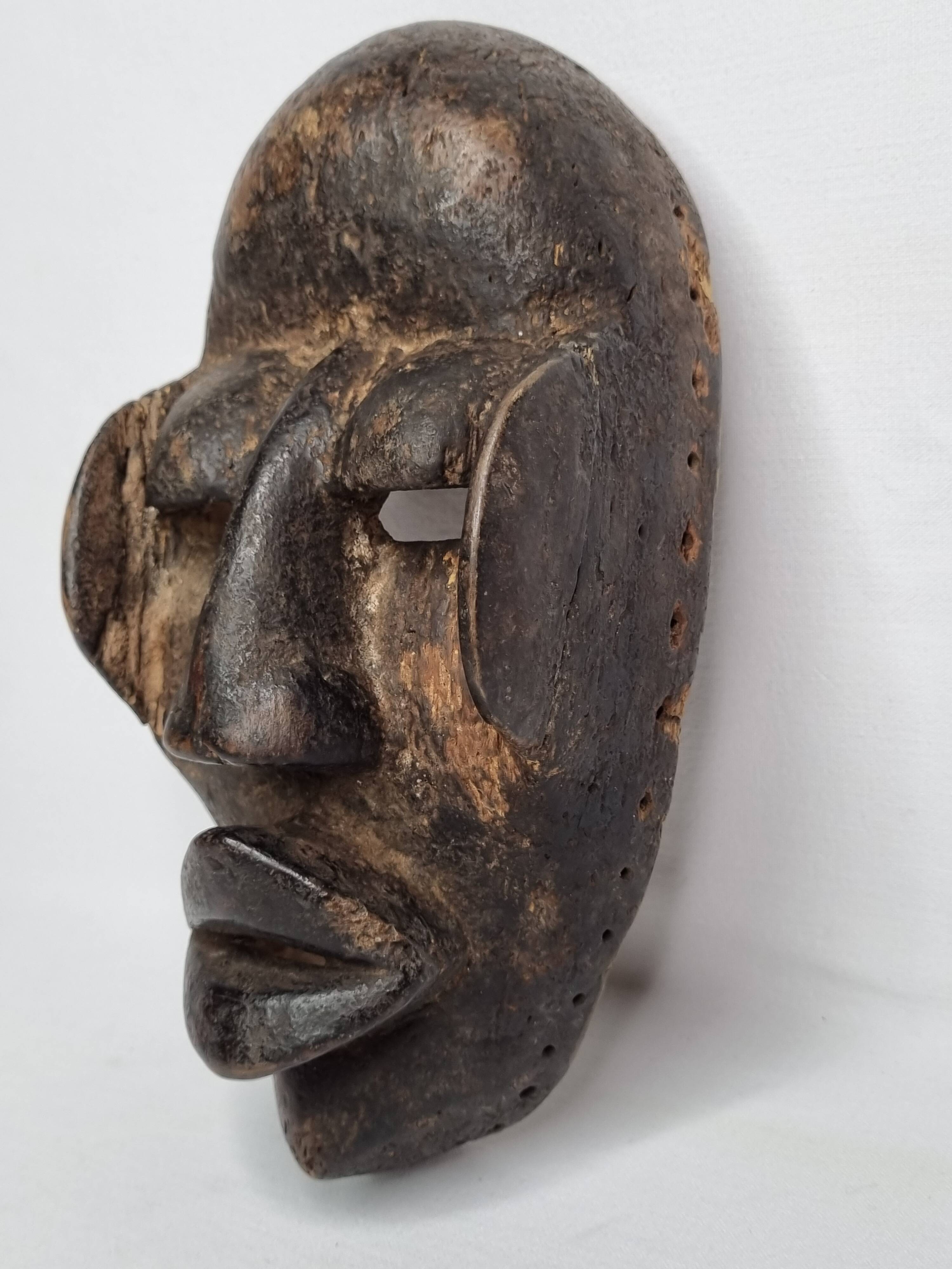 Dan Mask - Ivory Coast - Mid-20th century - Carved wood, 24 cm