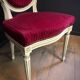 Paire de chaises médaillons rouges