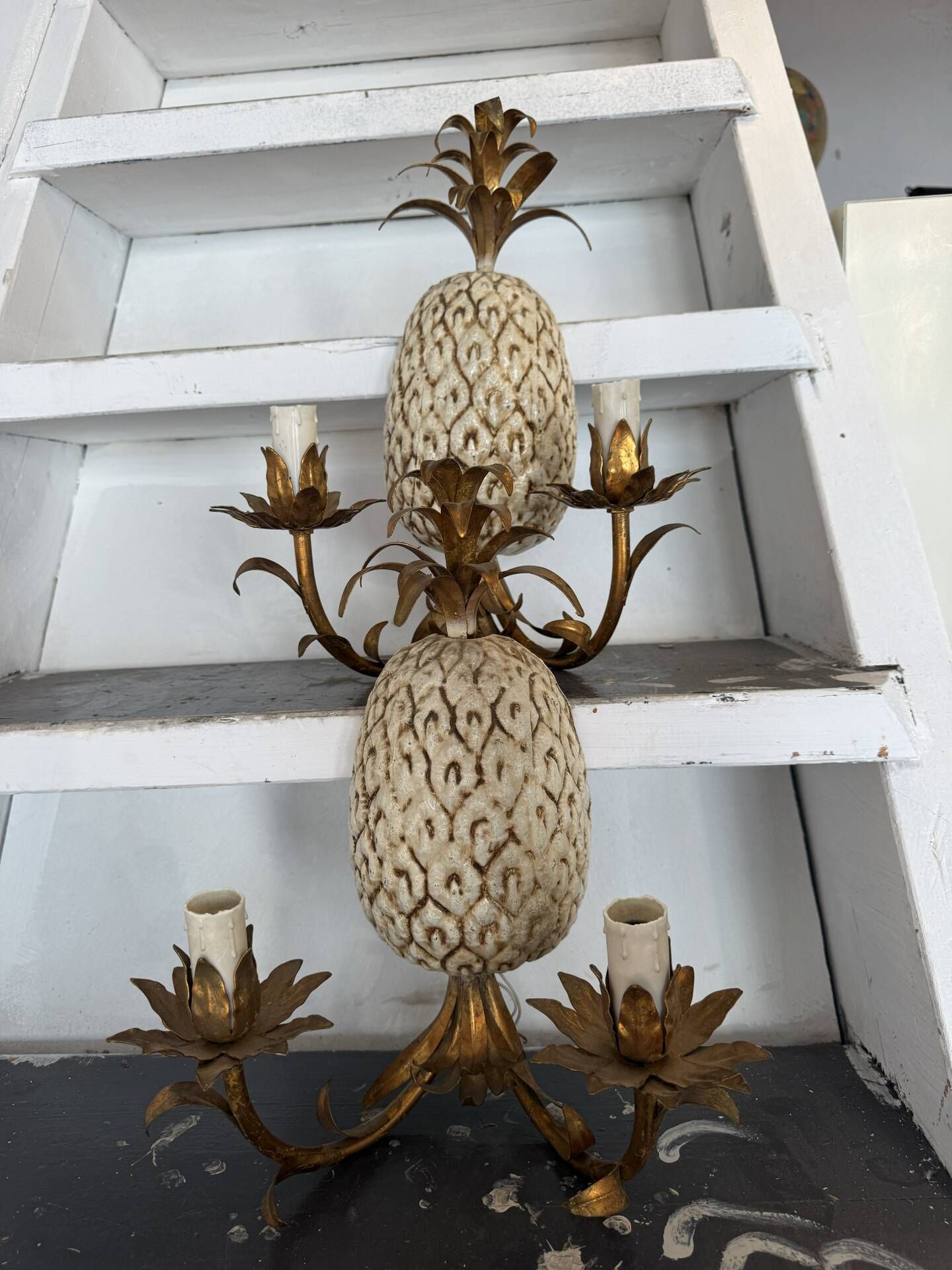 Pair of pineapple wall lights, in the style of Maison Charles / Jansen, an