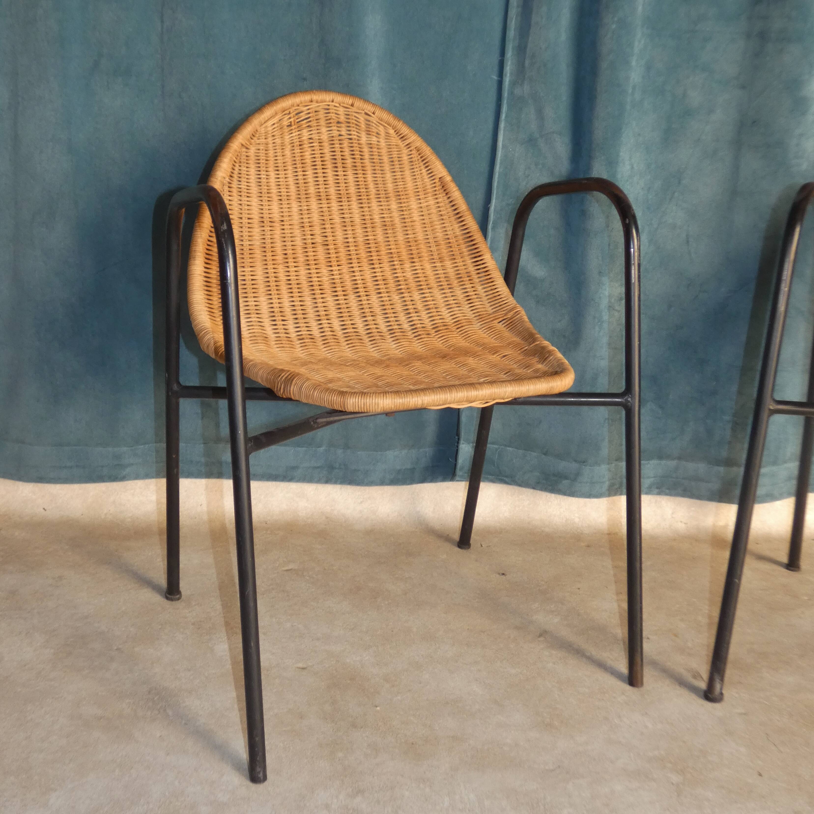 Pair of chairs / vintage armchairs in rattan and black lacquered metal
