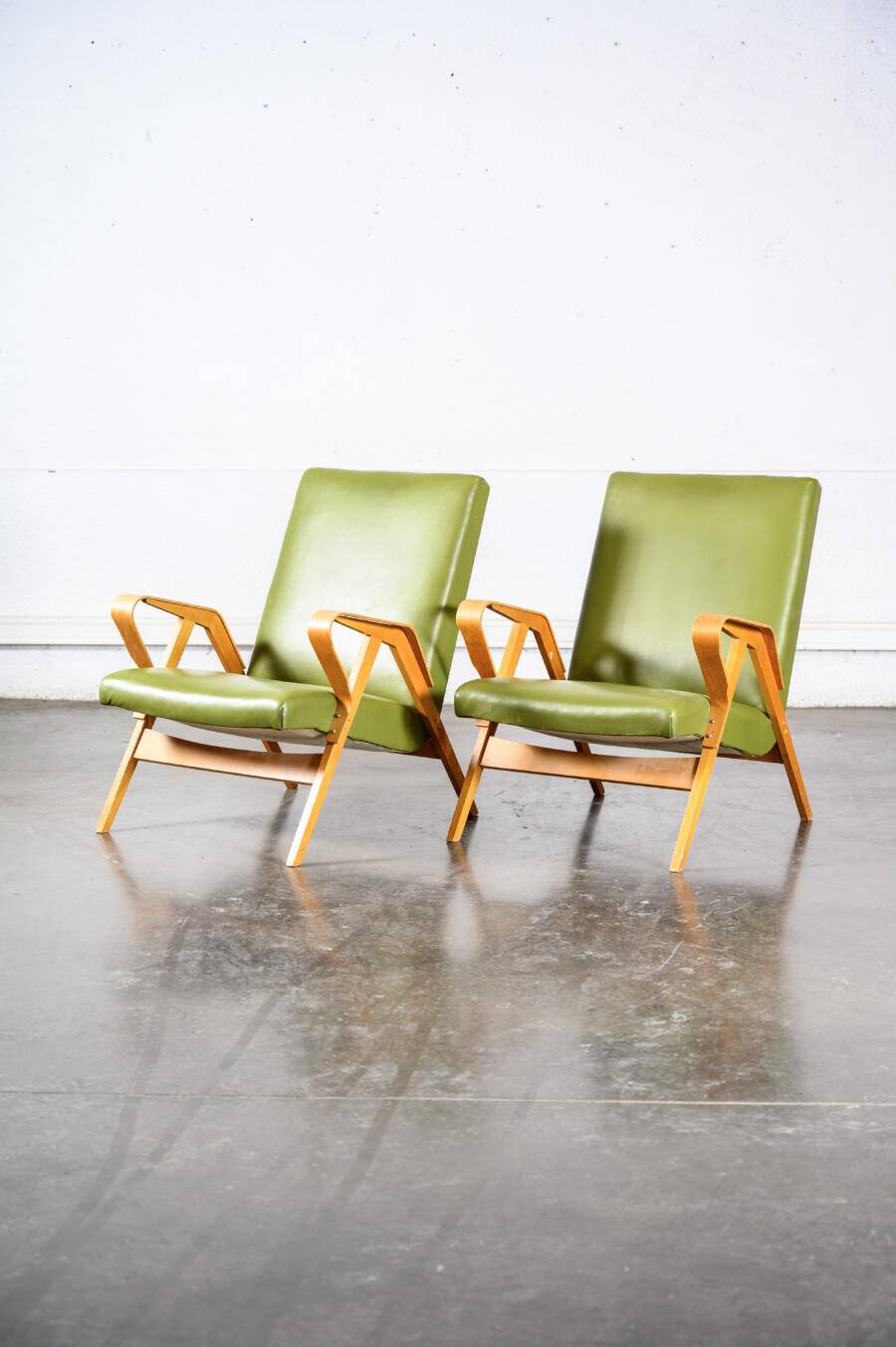 Fauteuil en skaï vert