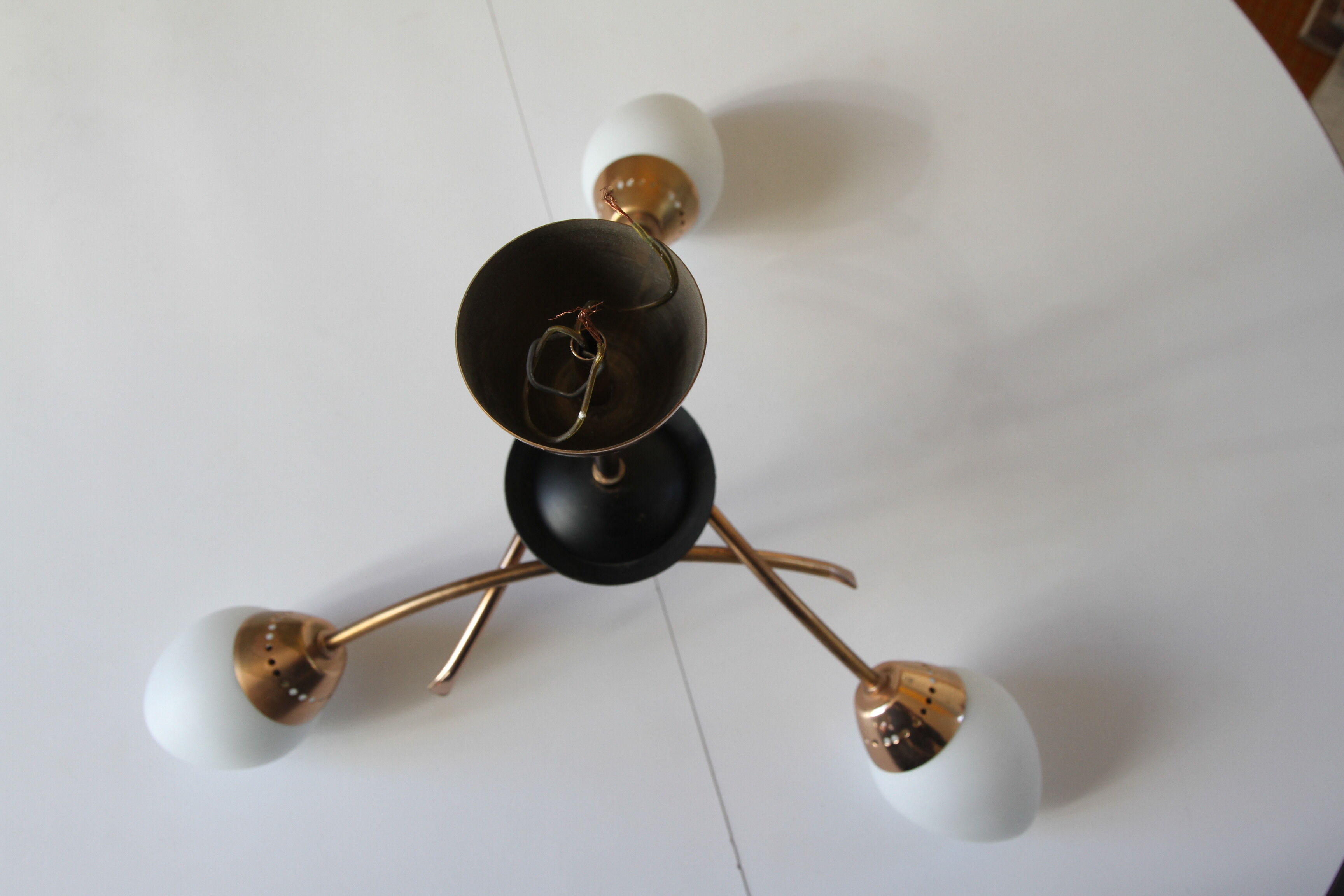 Three-arm brass and glass chandelier from the 1950s