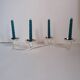 4-light silver metal candle holder