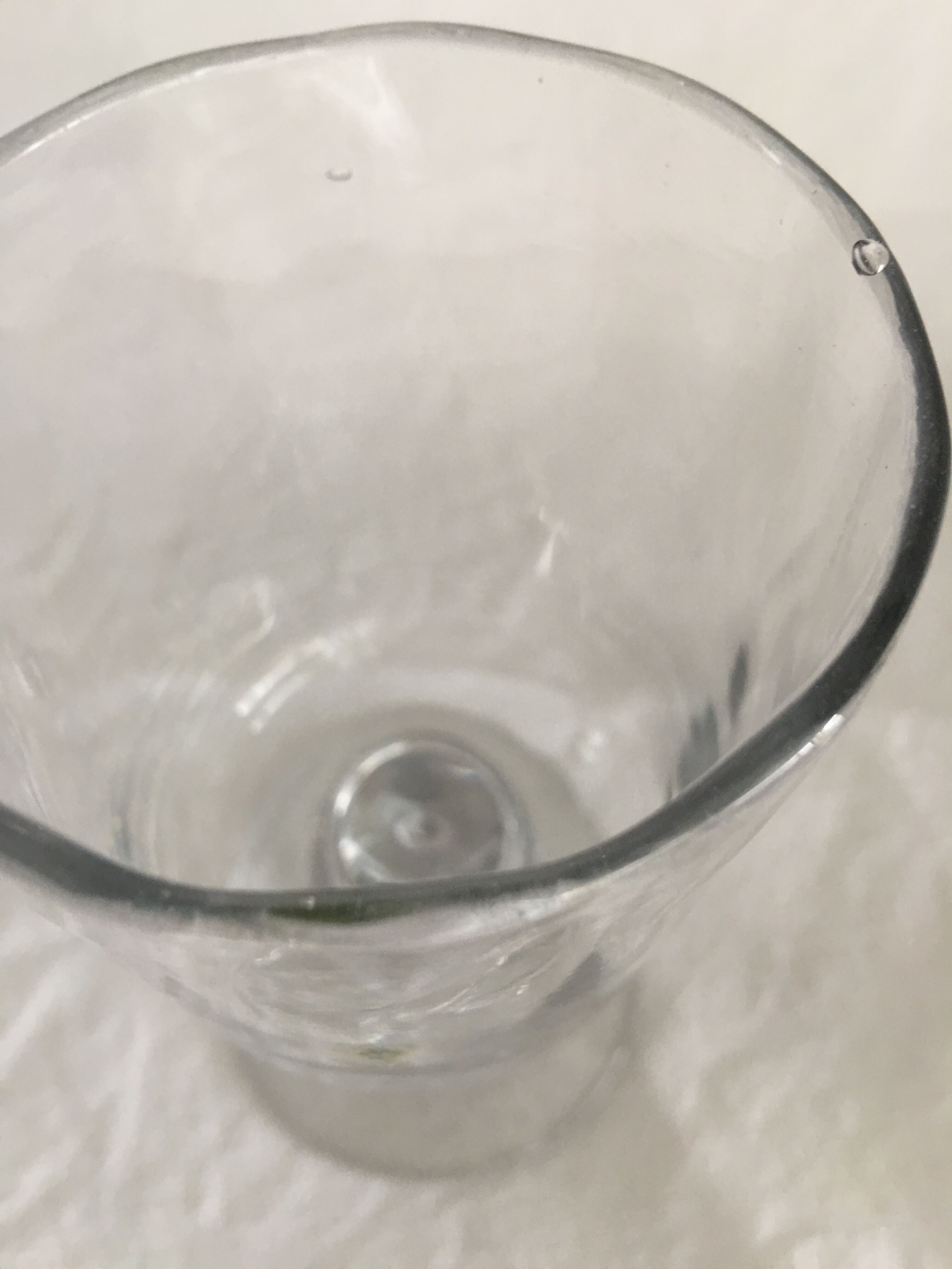 Glass on foot - blown glass bubble late nineteenth early twentieth
