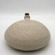 Old round sandstone hot water bottle