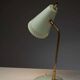 Adjustable table lamp in patinated brass and green metal