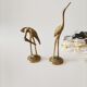 Brass heron duo
