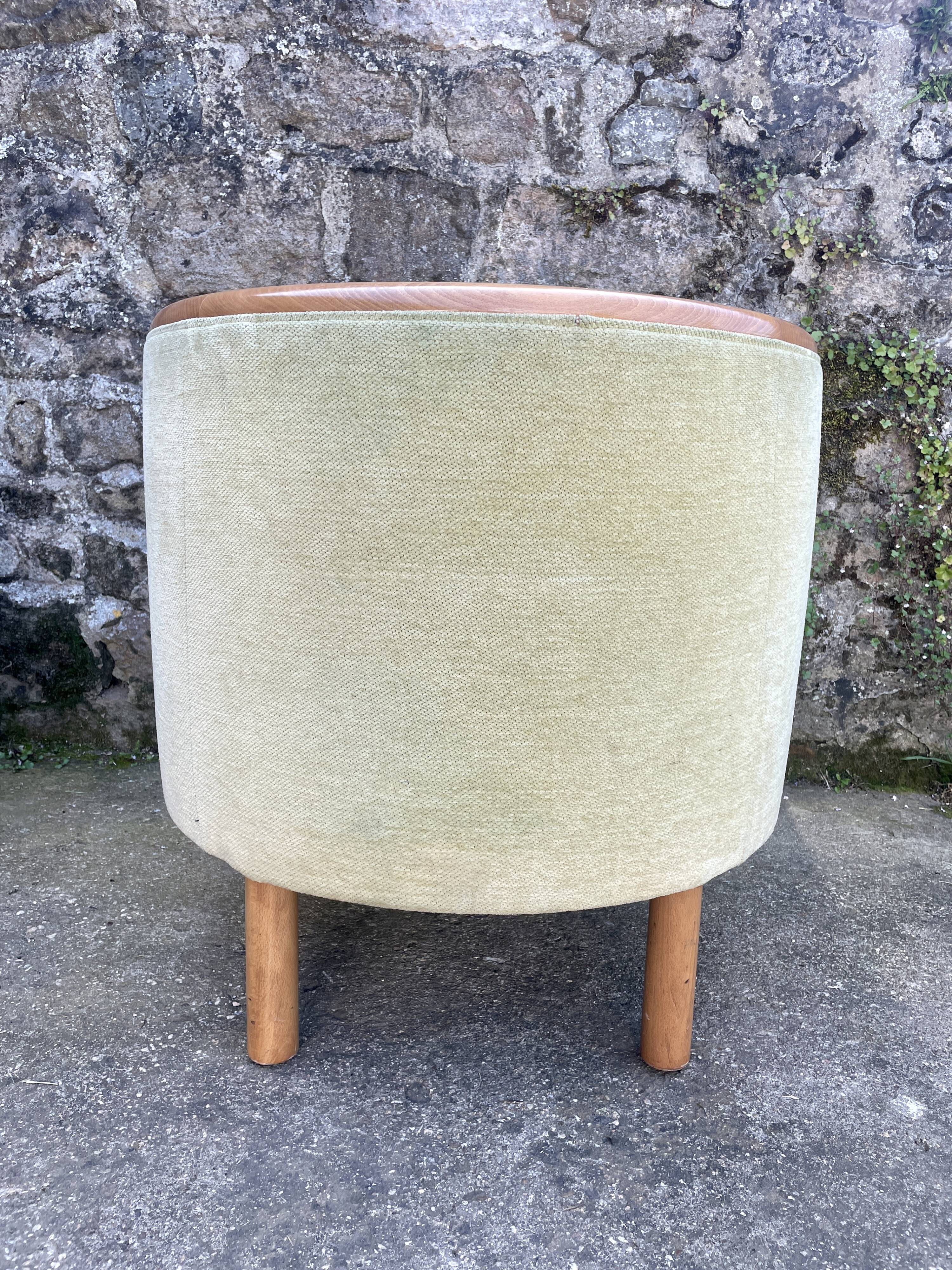 Pair of barrel-shaped armchairs in beech and almond green velvet by Maison Rosello