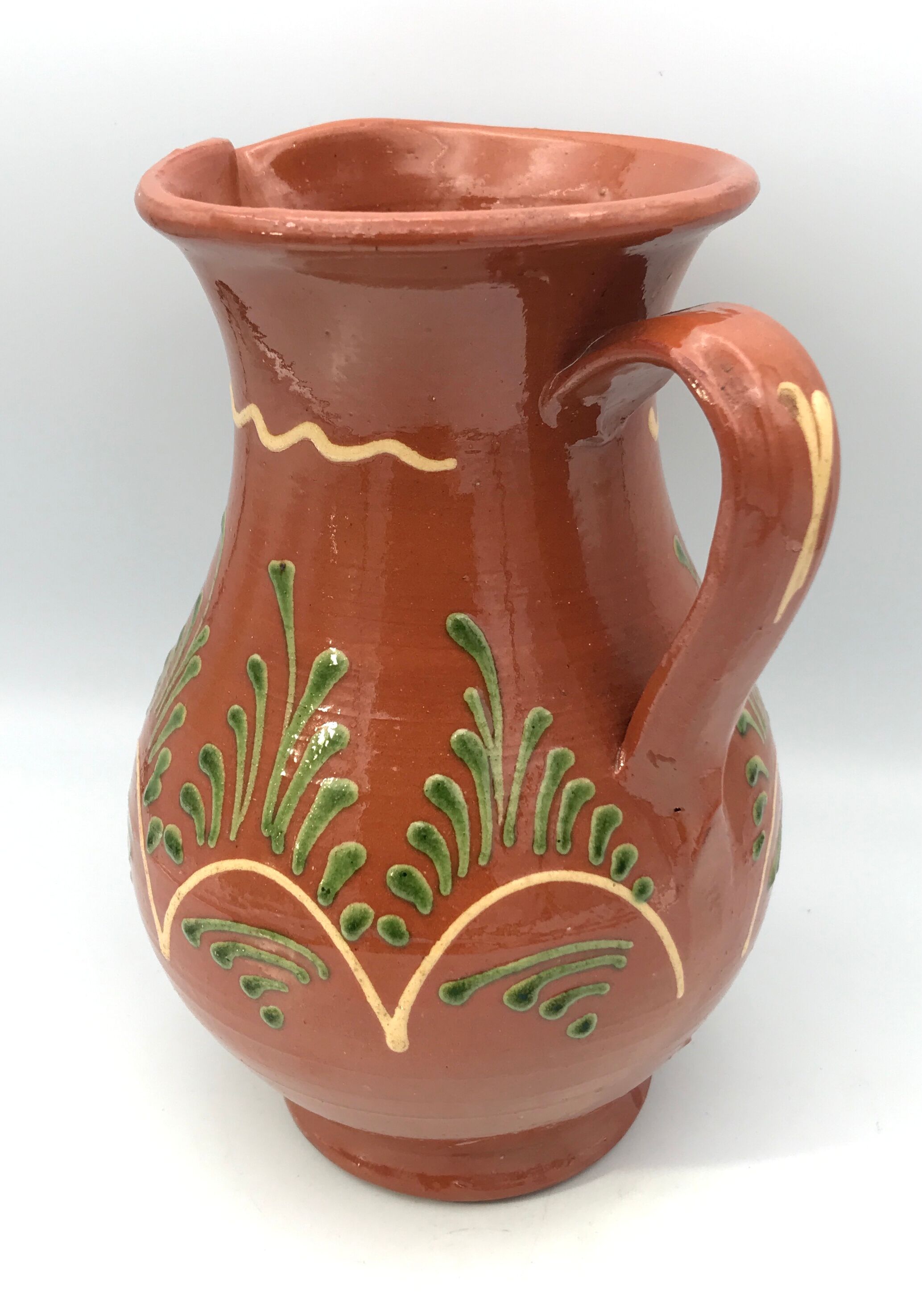 Vintage pitcher in glazed terracotta and polychrome décor