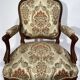Louis XV style living room including a pair of armchairs and three chairs
