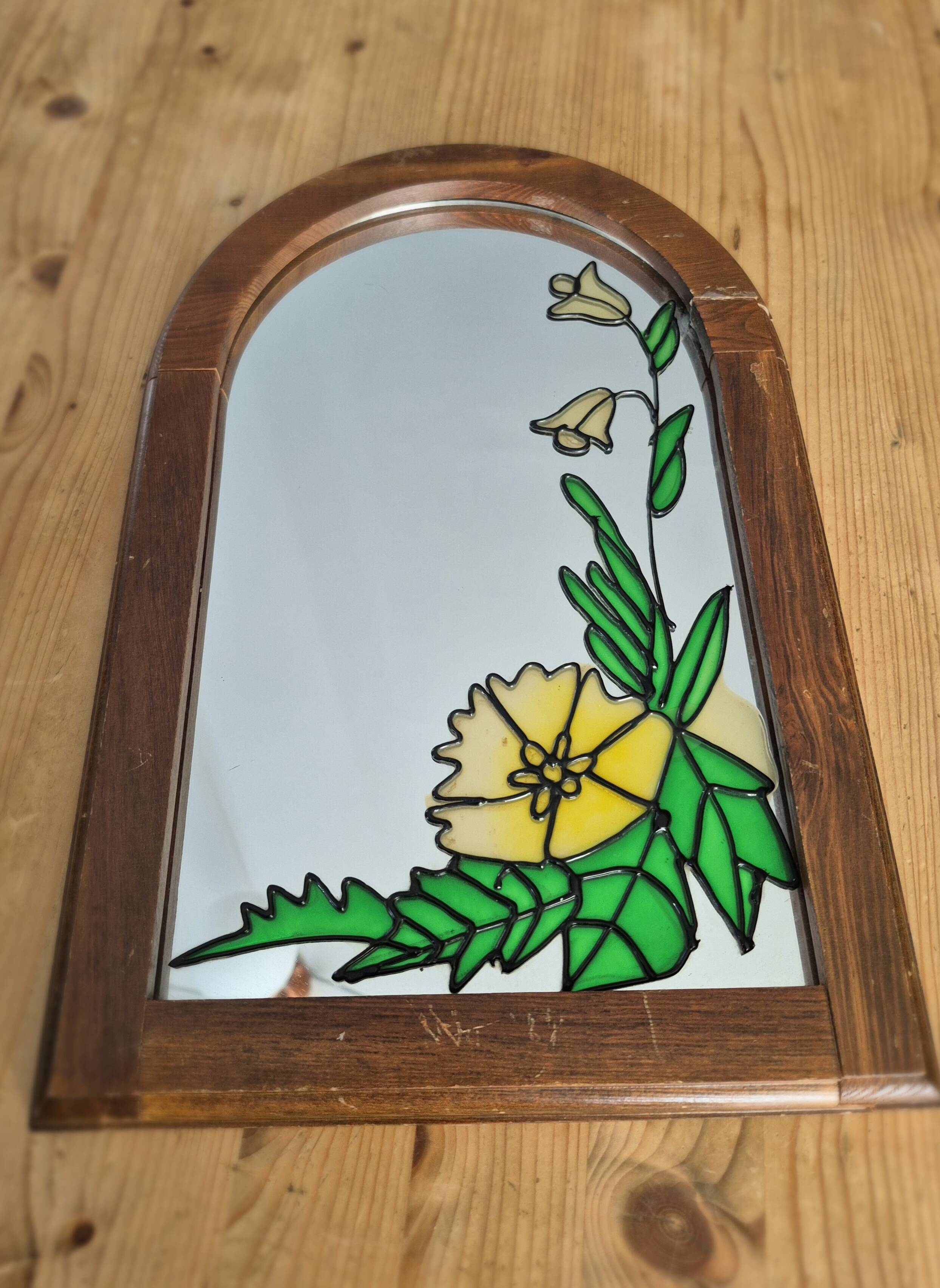 A pair of vintage stained glass style mirrors.