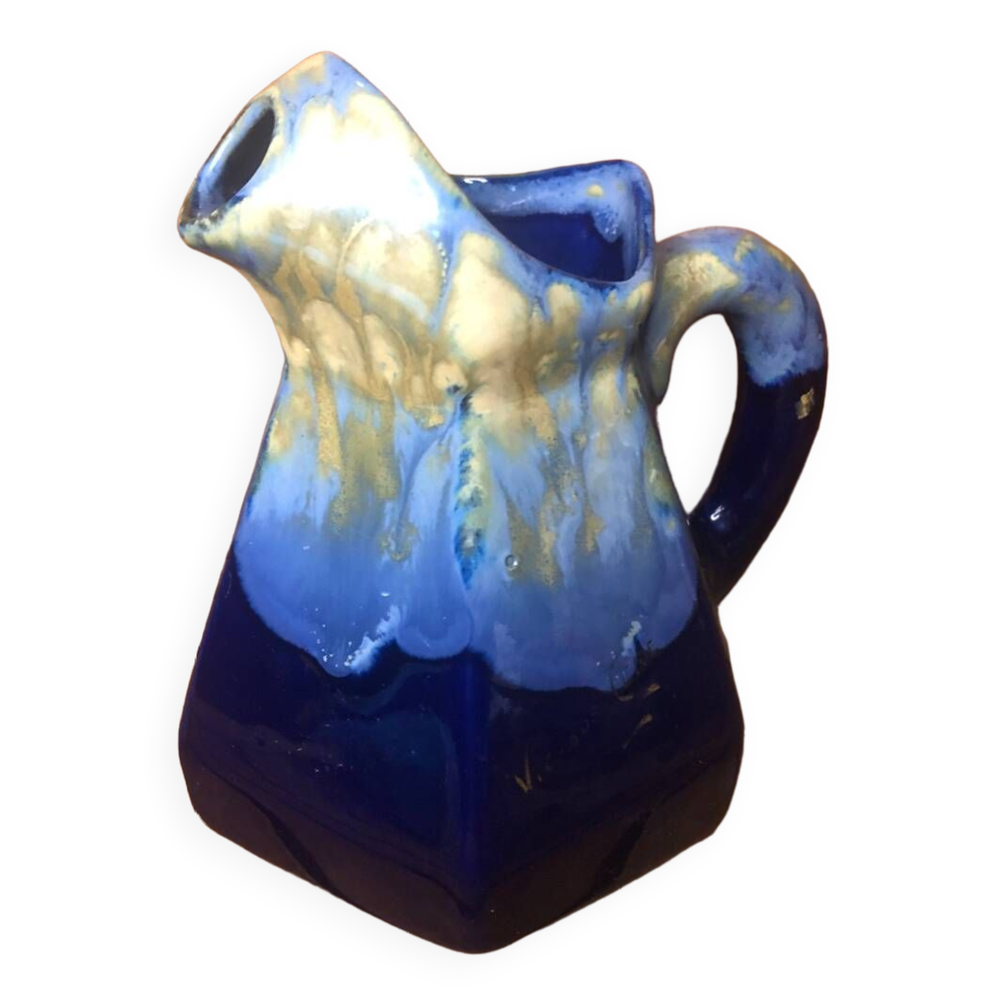 Old vintage blue ceramic pitcher