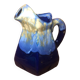 Old vintage blue ceramic pitcher
