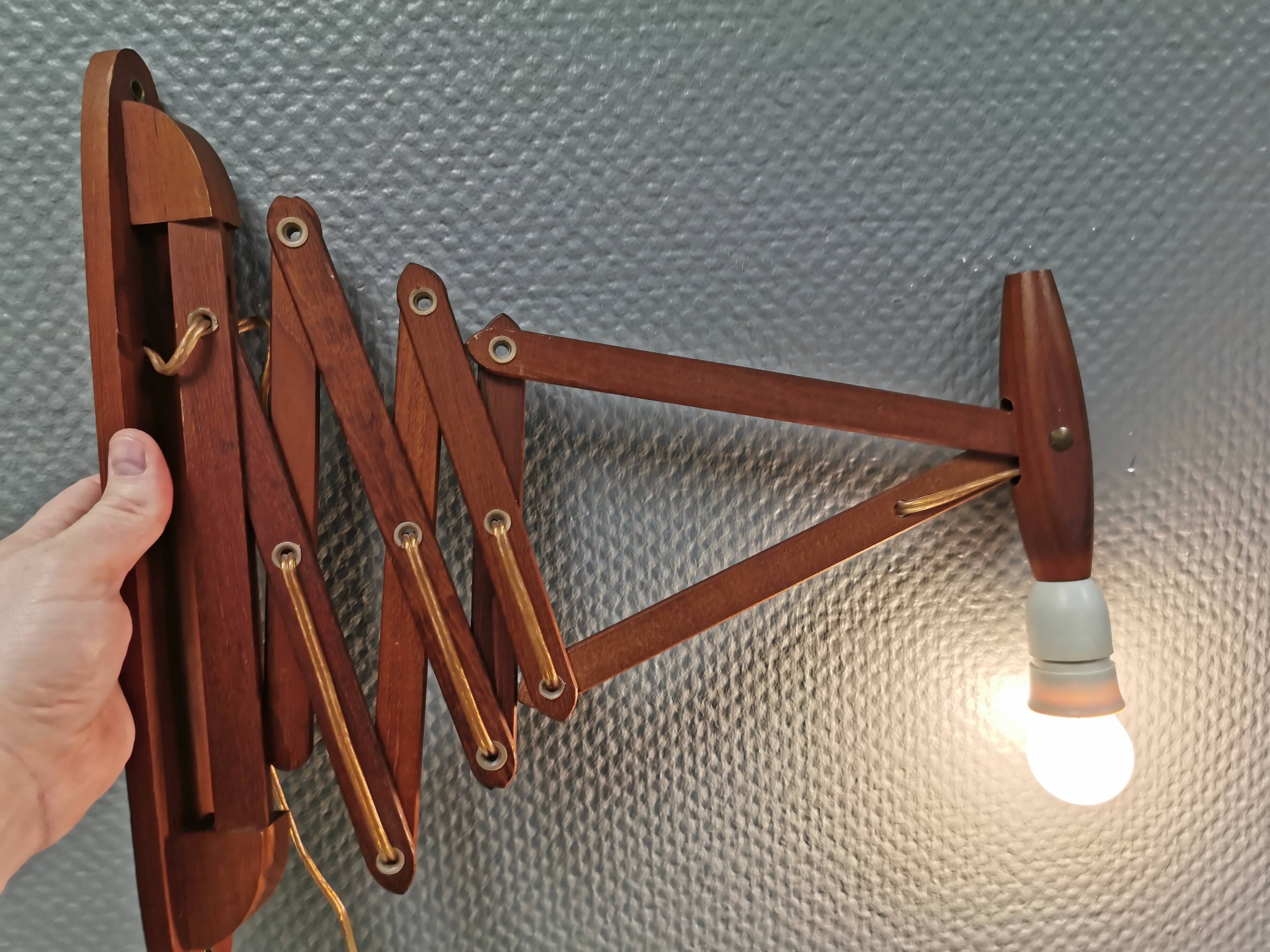 Wall lamp in teak, Denmark 1970-80s.