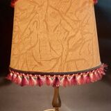 Desk lamp with brass base and lampshade with trimmings