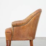 Sheepskin Chesterfield armchair with elegant design and lots of character