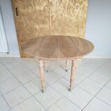 Round walnut shutter table