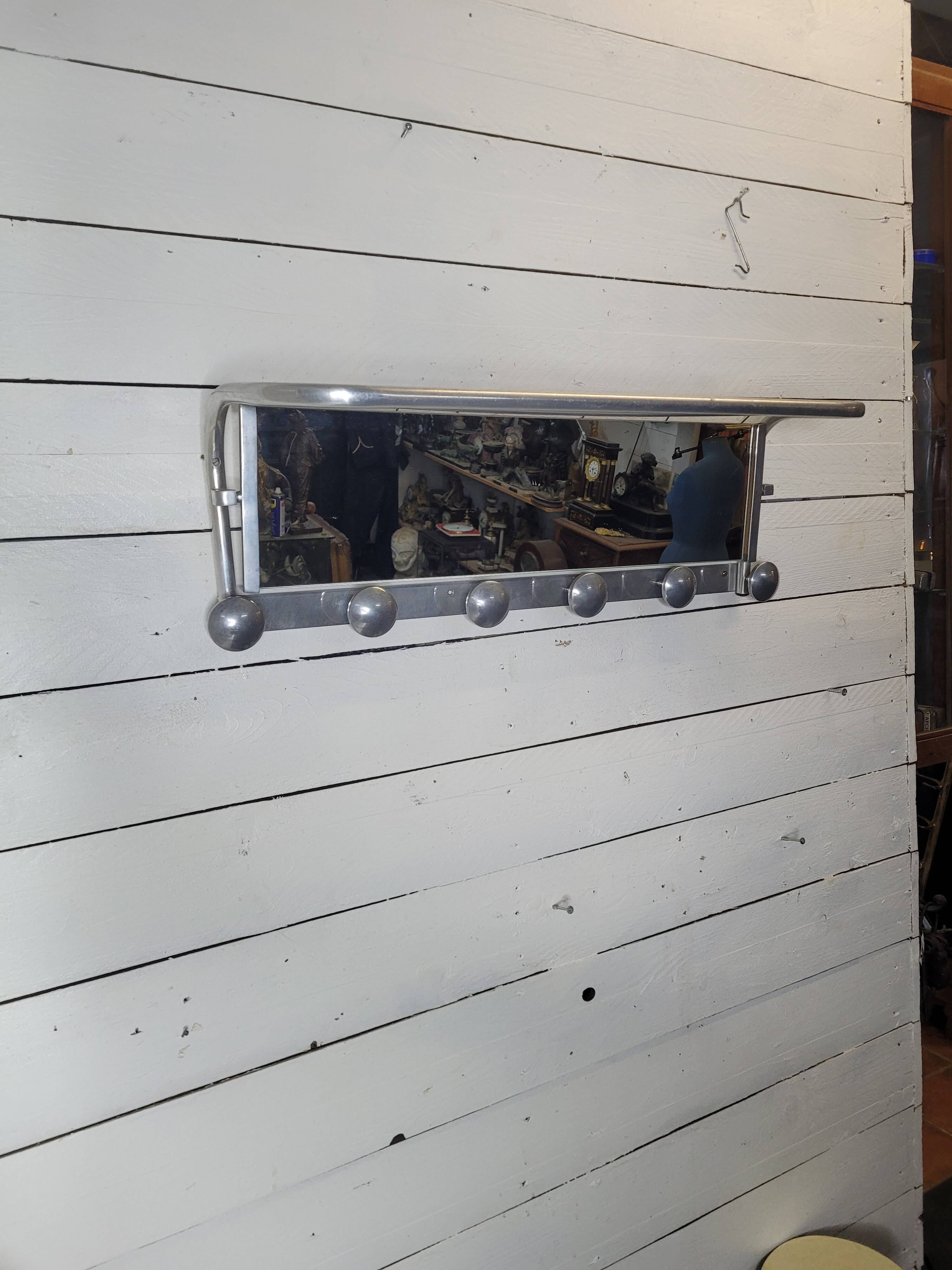 Aluminum wall coat rack with pivoting mirror from the 60s