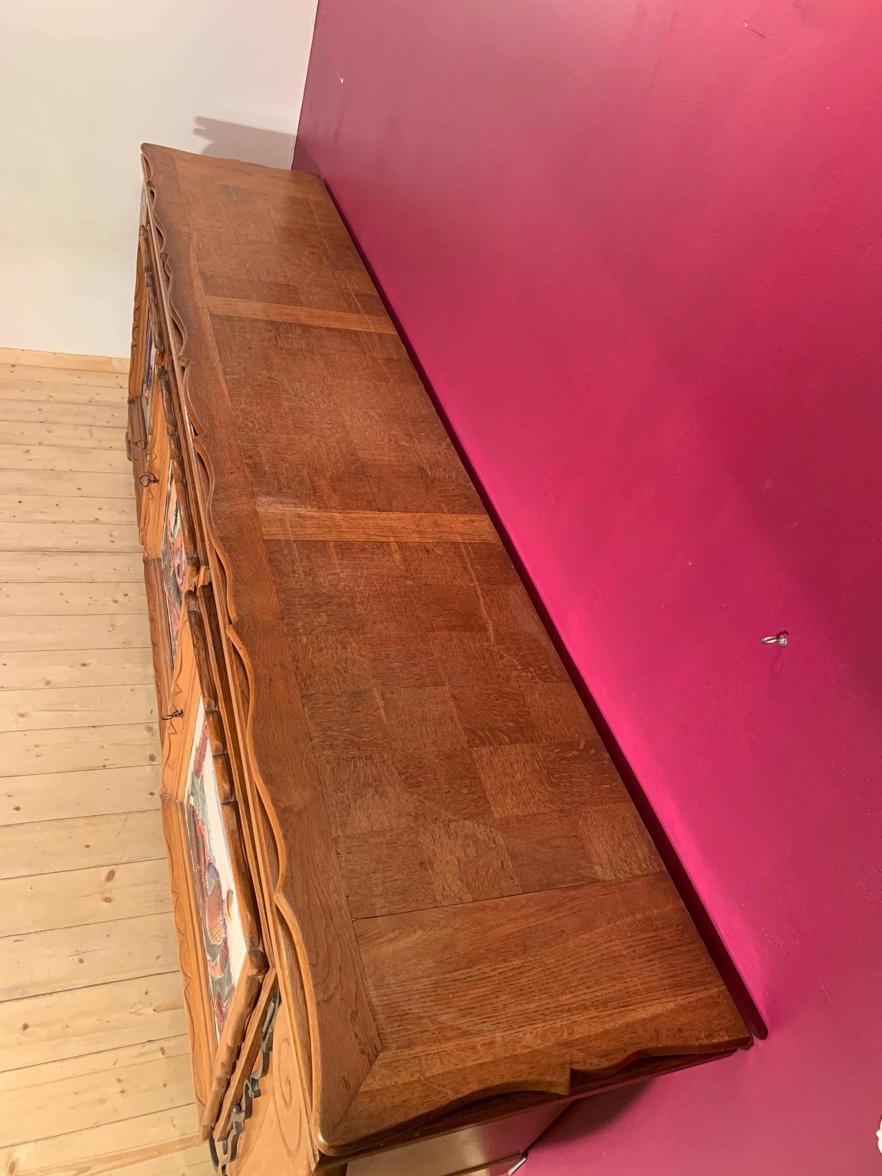 Modernist wood and ceramics sideboard of the 1950s