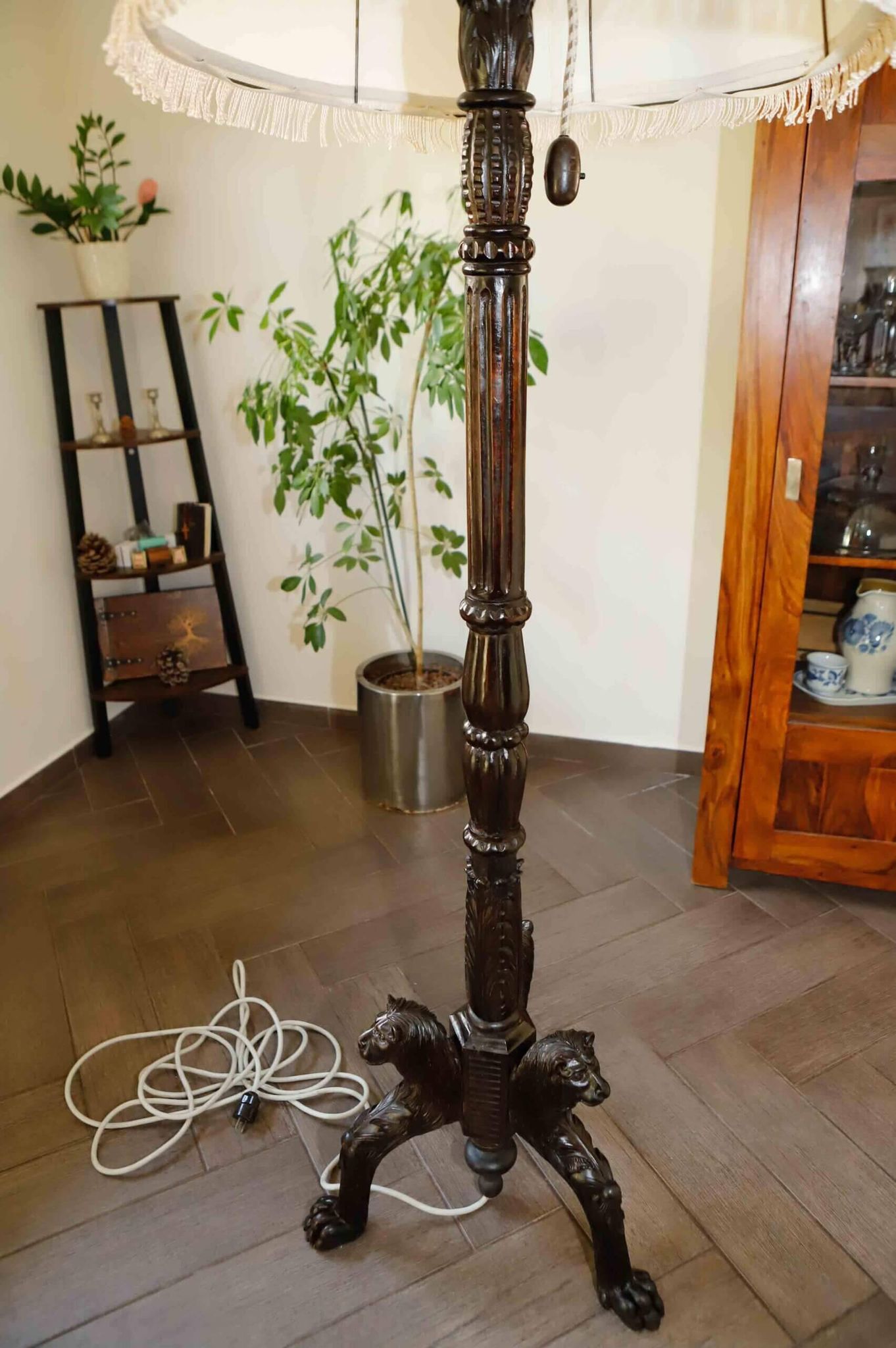 Antique floor lamp with lion motif