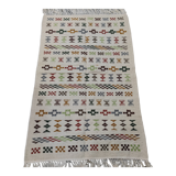 Handmade rugs in natural wool with traditional patterns