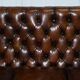 Chesterfield leather canapé in Georgian style with lion paw carved feet.