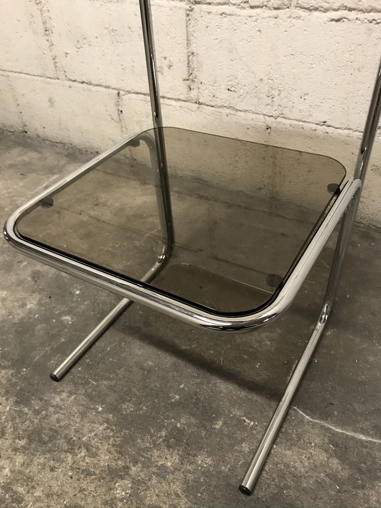 Sofa end in smoky glass and chrome metal, 70s