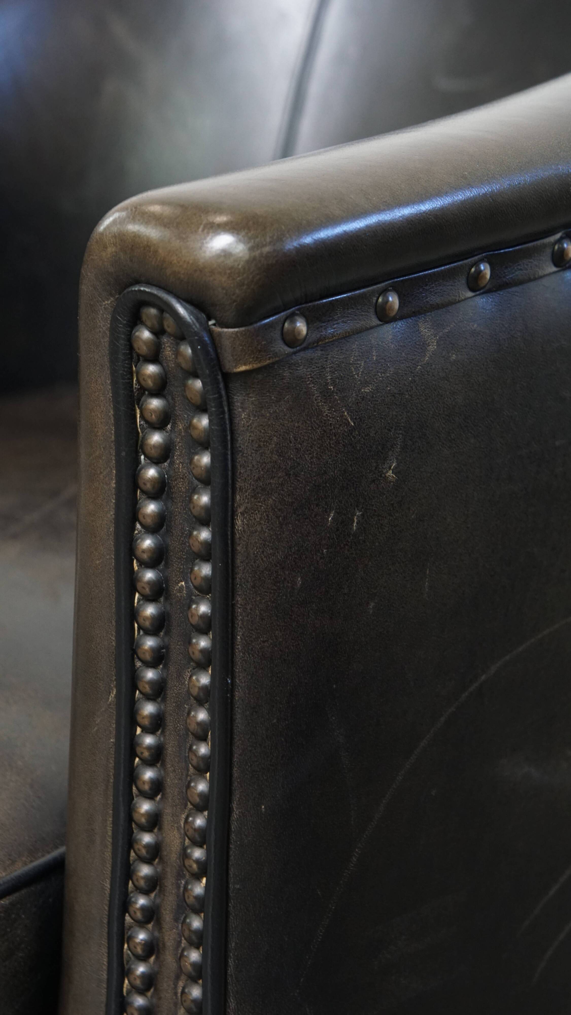 Set of 2  black/grey sheepskin leather club chairs