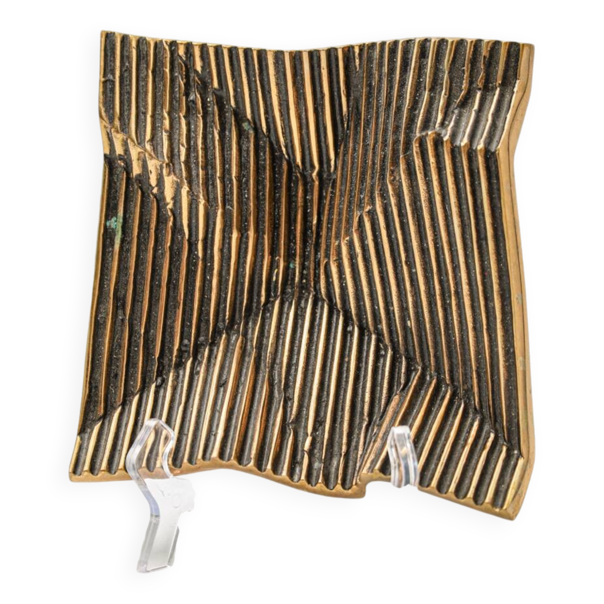 Brutalist bronze pocket emptier