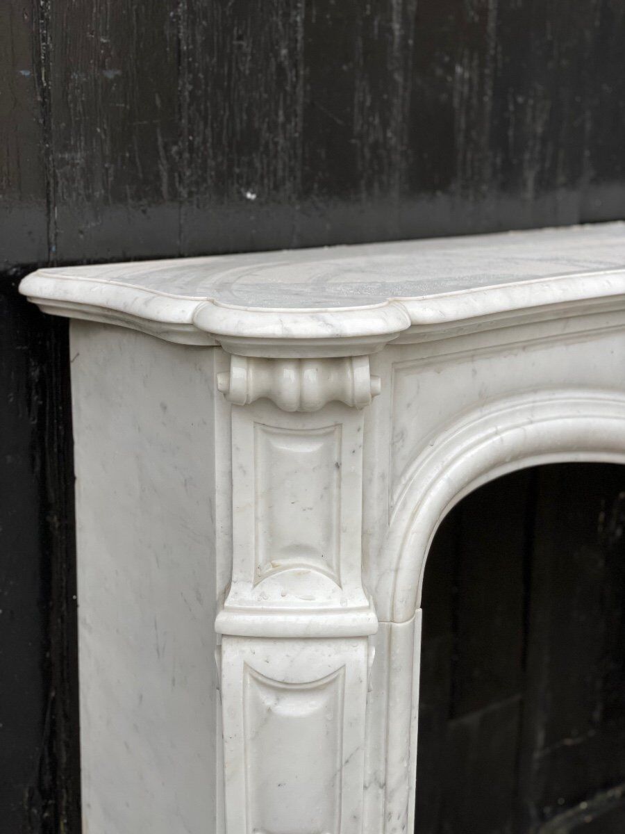 Louis XV style fireplace in Carrara marble